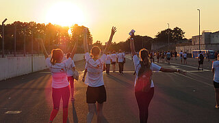 Picture with runners in the sunset